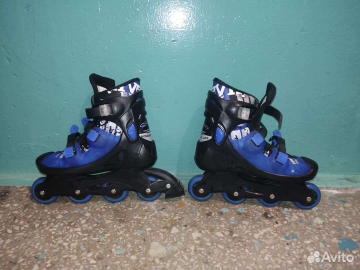 Роликовые коньки