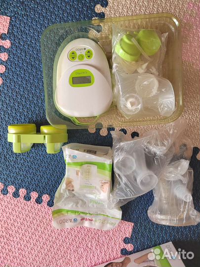 Молокоотсос на две груди электрический