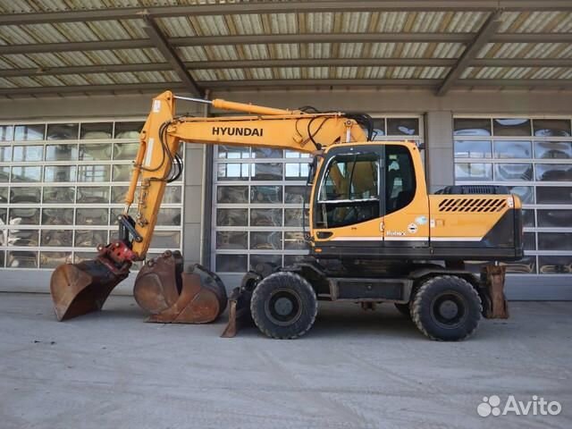 Колёсный полноповоротный экскаватор ковш 1м3