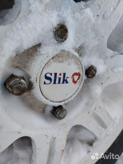 Наклейки Slik