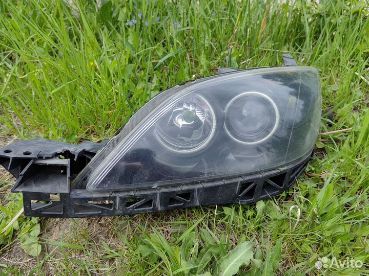 Фара передняя левая Mazda 3 bk хэтчбек