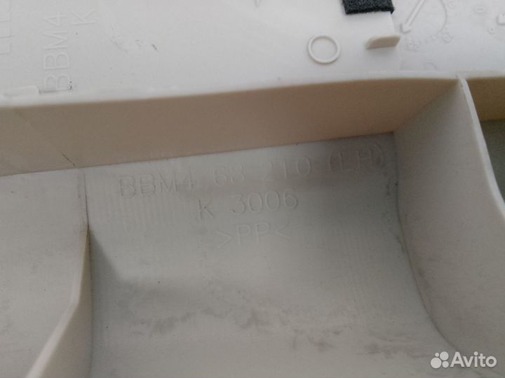 Обшивка стойки средней верхняя левая Mazda 3 BL