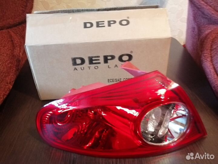 Фонарь левый новый на Шевроле Лачетти