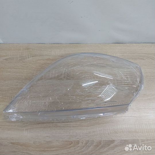 Стекла фар Nissan Tiida