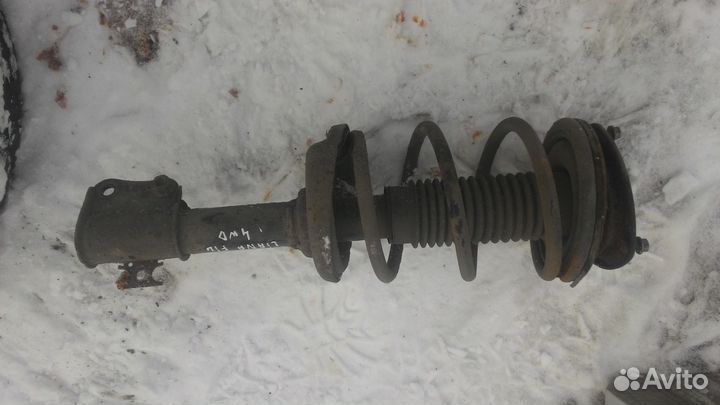 Аммортизатор передний левый Suzuki Liana 2003г