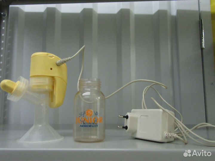 Молокоотсос medela электрический