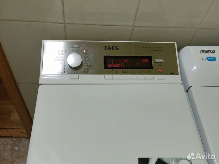 AEG с вертикальной загрузкой 6 кг 1500 об