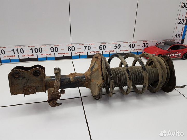 Амортизатор передний правый с пружиной