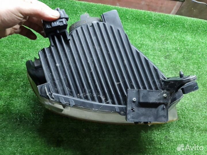 Фара передняя левая Toyota Bb QNC25