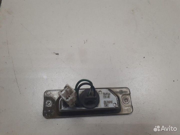 Фонарь подсветки номера Nissan Almera