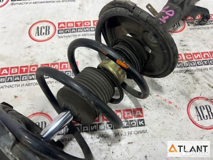 Стойка передняя левая toyota corolla