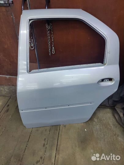 Задняя левая дверь Renault Logan 1