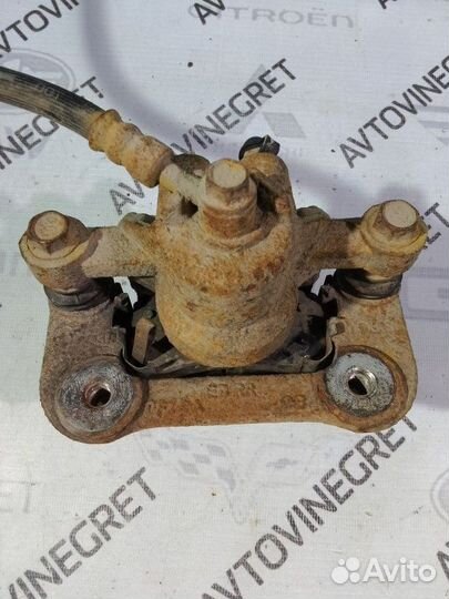 Суппорт тормозной задний Kia Cerato 1