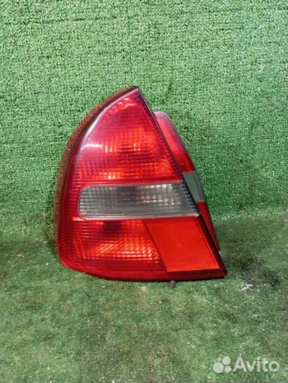 Фонарь задний левый Mitsubishi Carisma