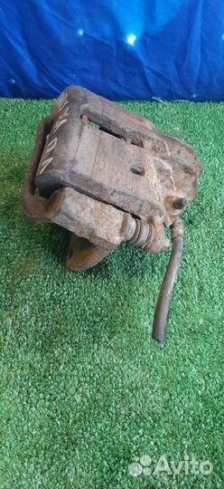 Суппорт тормозной передний левый Mitsubishi