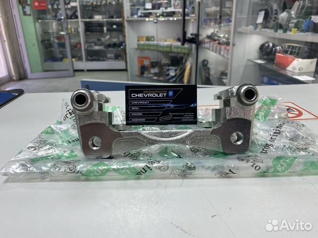 Скоба тормозного суппорта переднего Авео