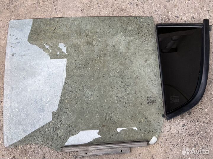 Стекло двери заднее левое правое Mitsubishi L200