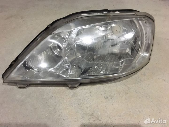 Фара битая левая Renault Logan 2012