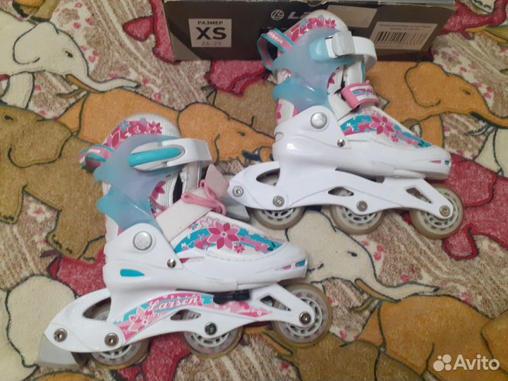 Коньки роликовые