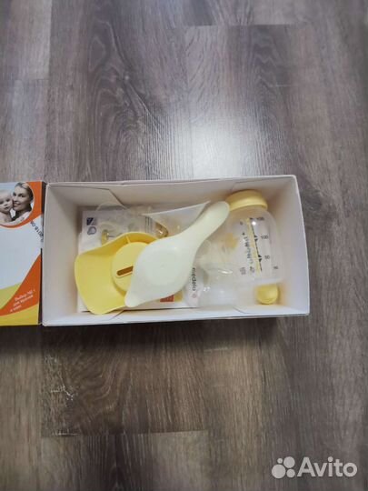 Молокоотсос medela harmony ручной