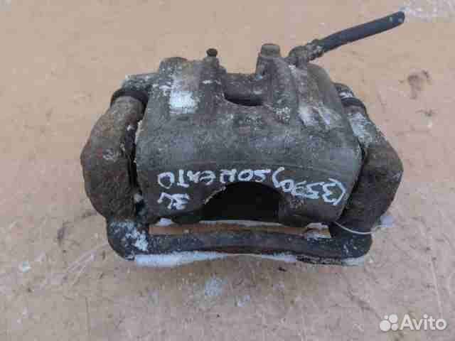 Суппорт задний левый Kia Sorento 2 XM