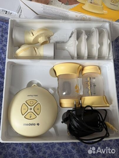 Молокоотсос medela электрический