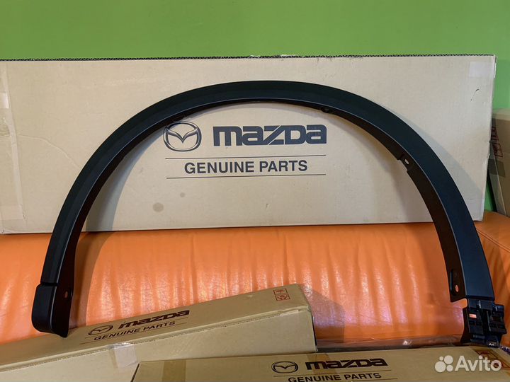 Накладка новая переднего левого крыла Mazda CX-5