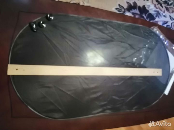 Солнцезащитная шторка на заднее стекло автомобиля