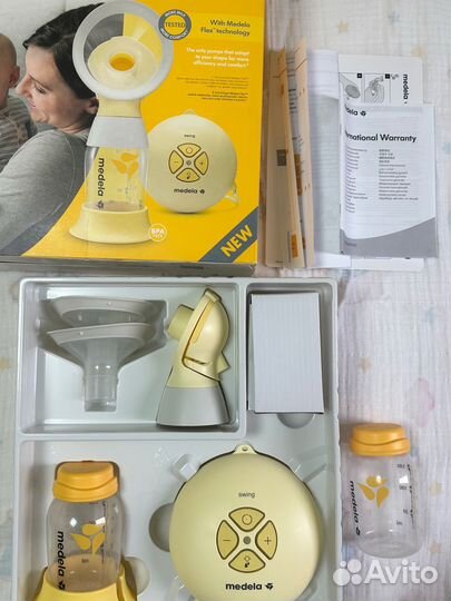 Молокоотсос medela электрический