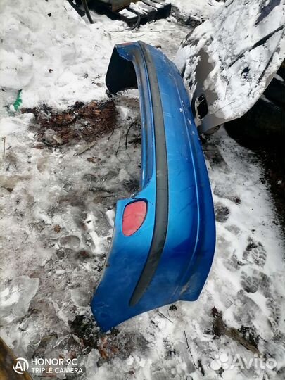 Бампер задний nissan almera tino