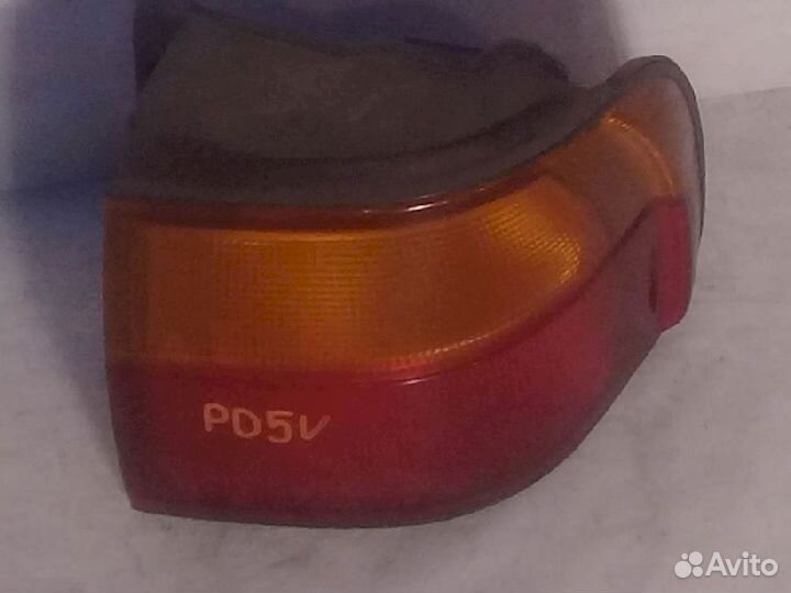 Фонарь (стоп сигнал) задний правый 220-87009 желты