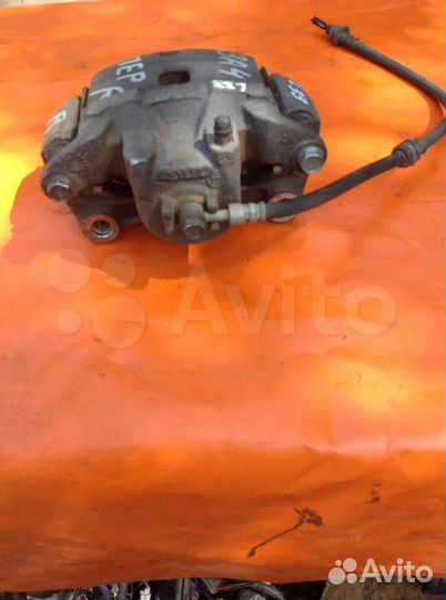 Суппорт тормозной передний правый Nissan Teana L3