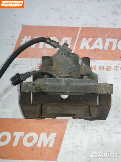 Суппорт тормозной передний левый Skoda Octavia