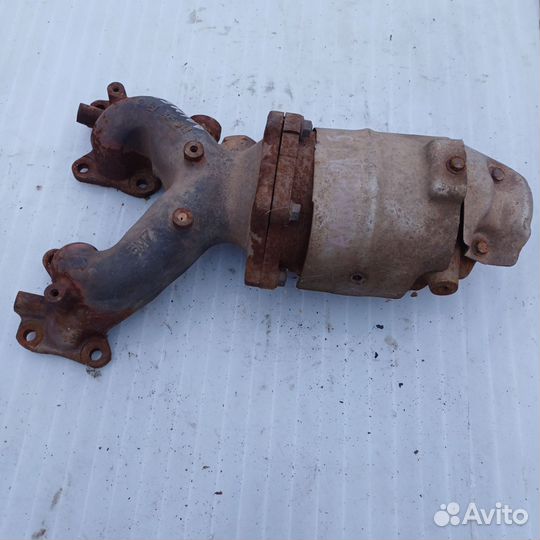 Колектор выпускной на Ниссан Алмера н16