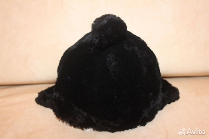 Женские меховые шапки