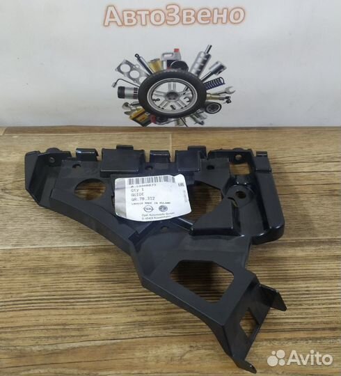 Кронштейн перед. бампера правый Oпель Астра J