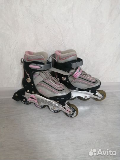 Коньки роликовые