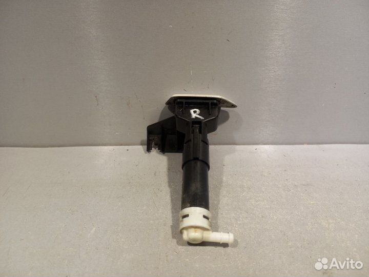 Форсунка омывателя фар правая Mitsubishi Outlander