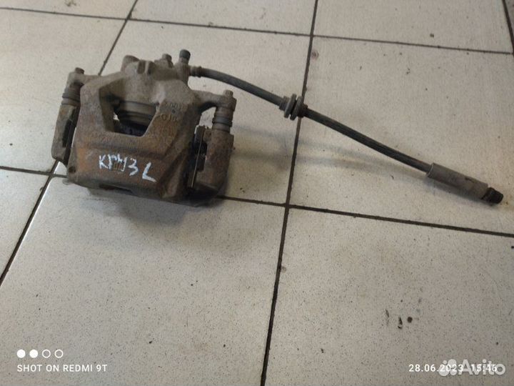 Суппорт тормозной передний левый Chevrolet Cruze