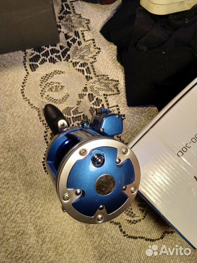 Спиннинг и катушка для троллинга новые