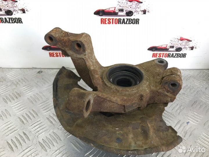 Кулак поворотный левый Kia Spectra седан S6D 2007