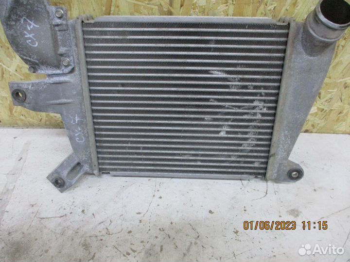 Радиатор интеркулера Мазда сх-7 2,3 АКПП