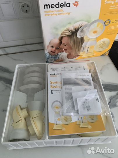 Молокоотсос medela swing maxi flex