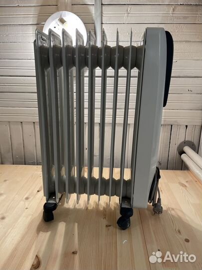 Масляный обогреватель delonghi