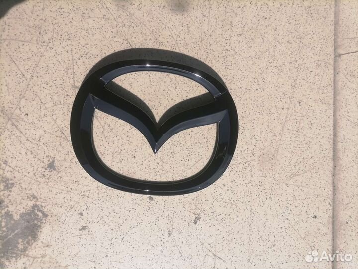 Эмблема mazda 6