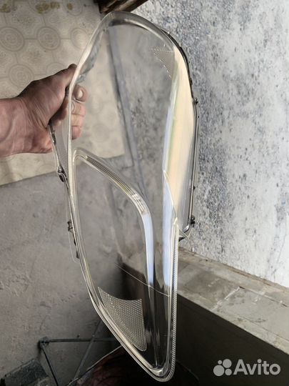 Стекло фары левое Тойота корола 120