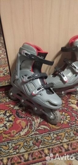 Роликовые коньки