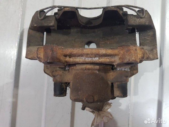 Суппорт тормозной передний левый Volkswagen Polo