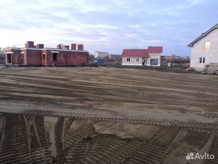 Отсыпка и выравнивание участков