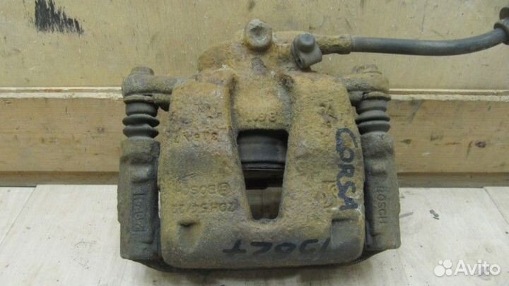 Суппорт передний левый Opel Corsa D 2006-2015